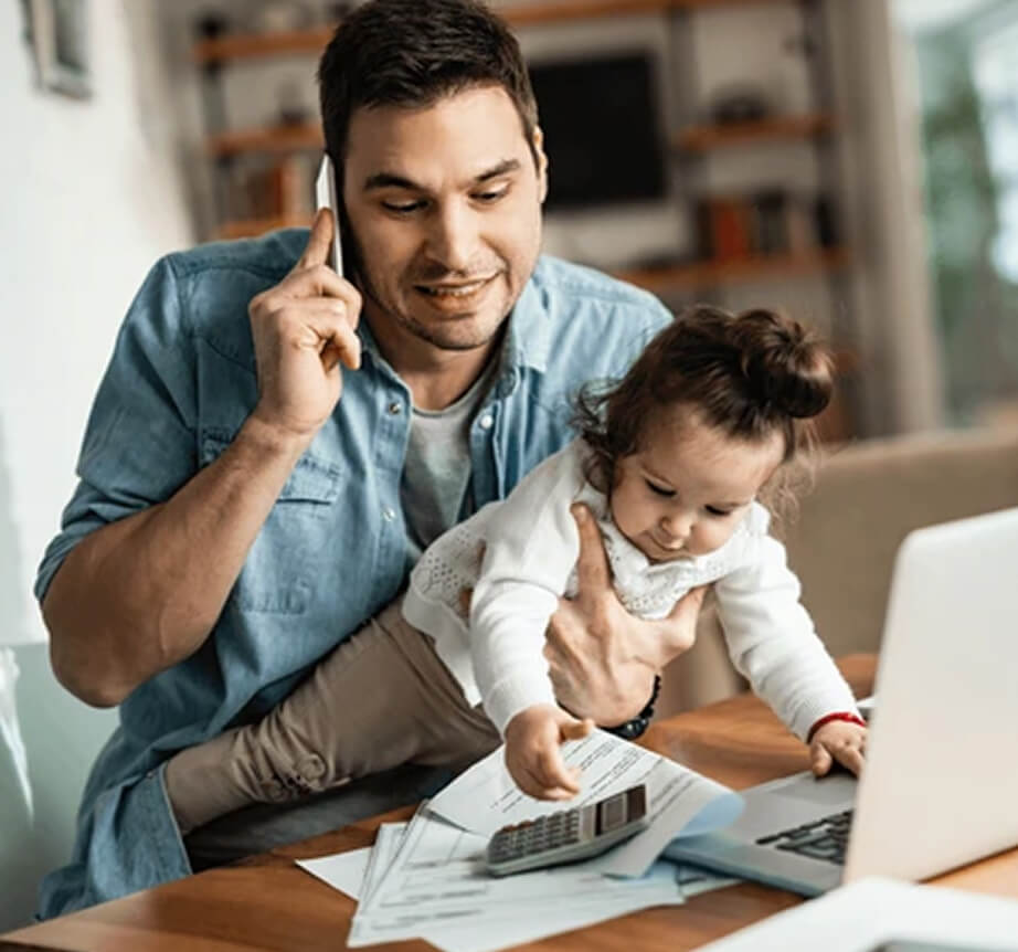 Strategic coaching session for CEO parents — laptop and planning tools on a modern desk